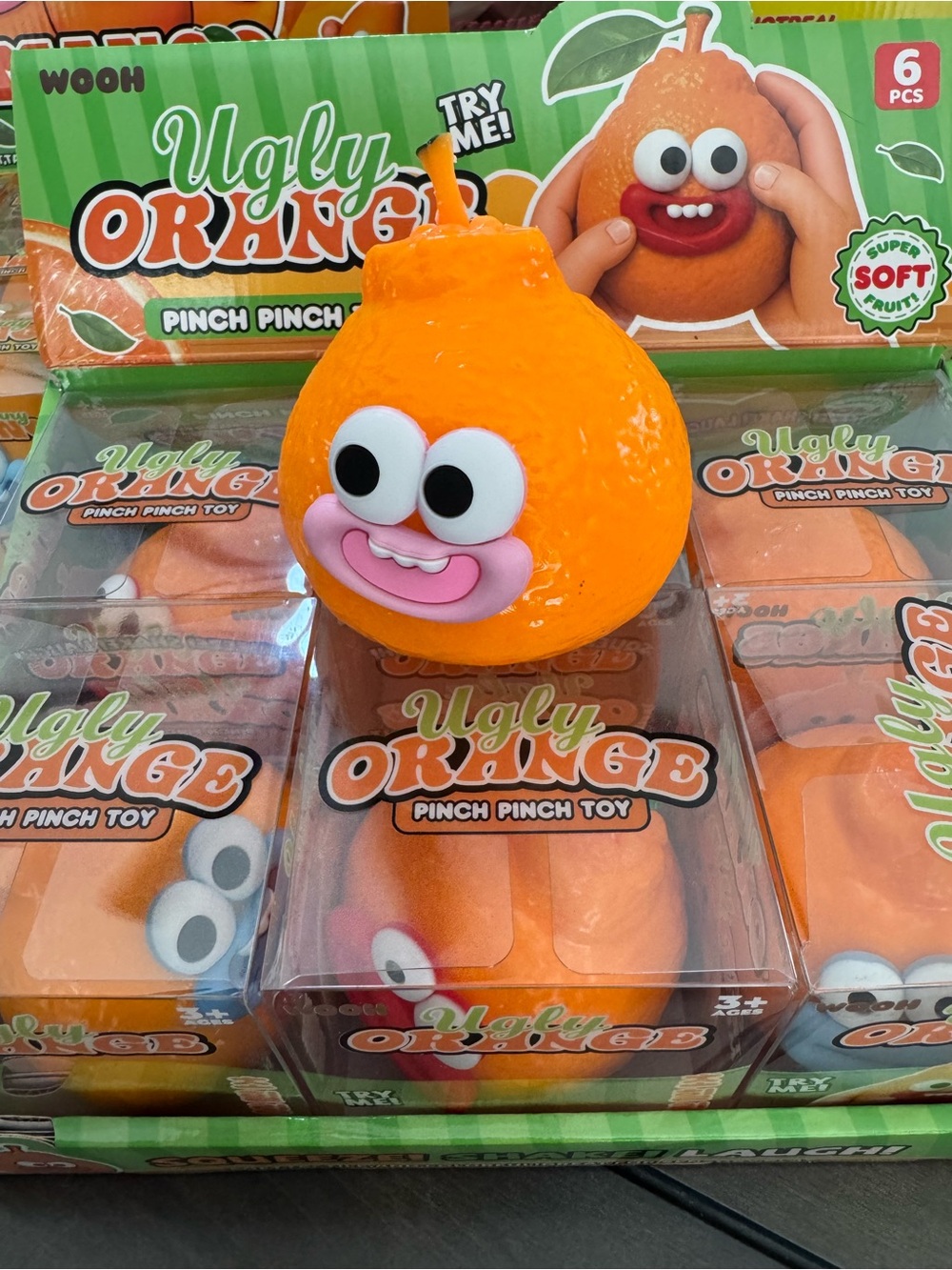 Ugly Orange Pinch Pinch Toy - Orange